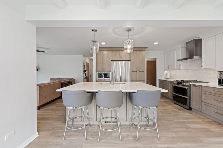 kitchen with beige island 