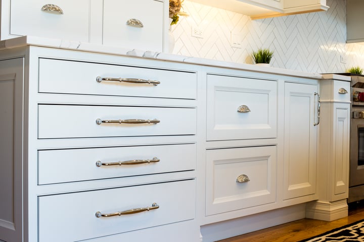 brass hardware on white cabinets 