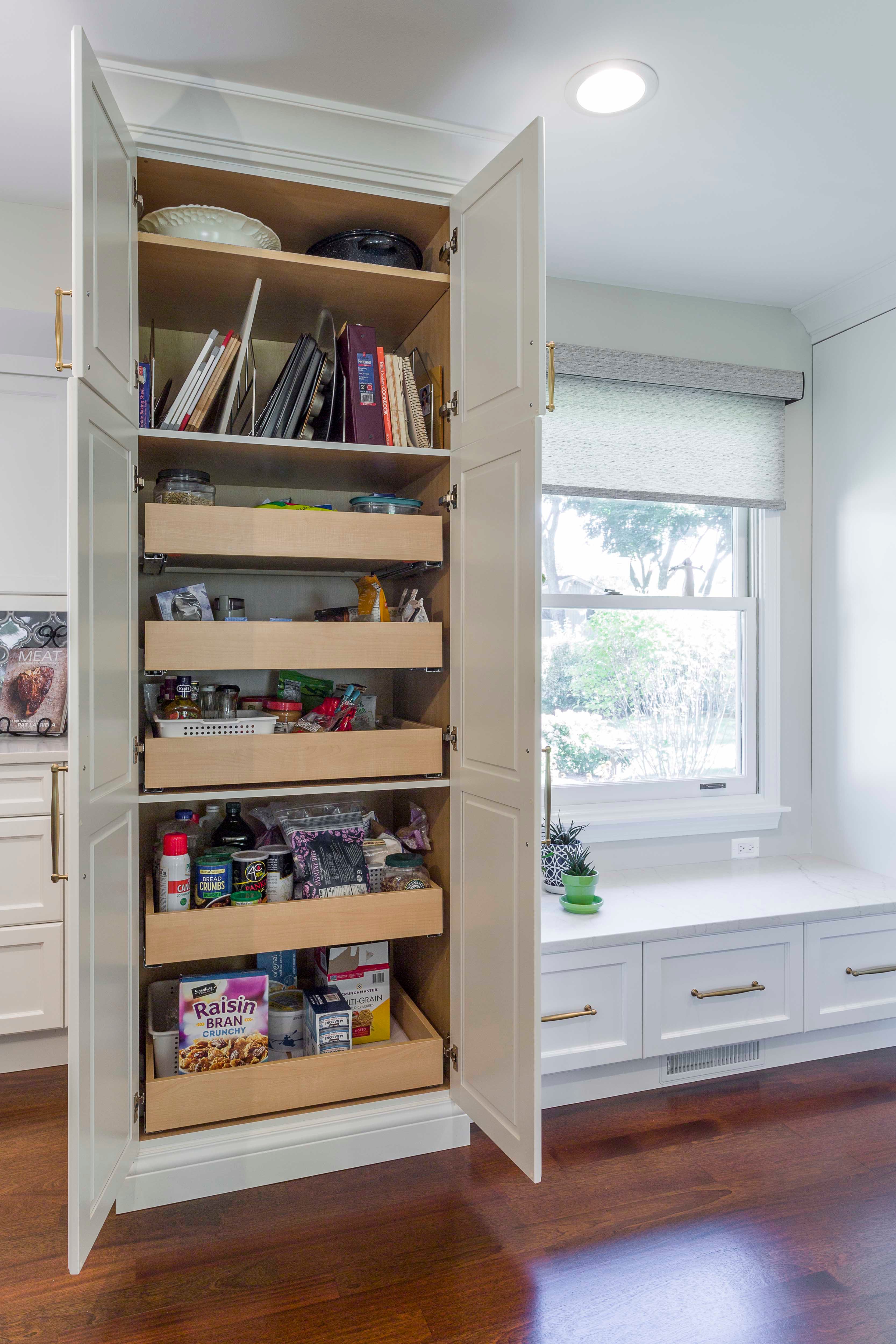 Cabinet pantry with pull-out shelves. 