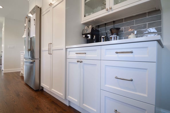 kitchen with white cabinets and nickel hardware